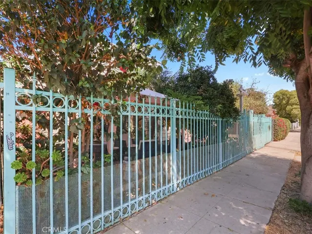 a view of street from balcony