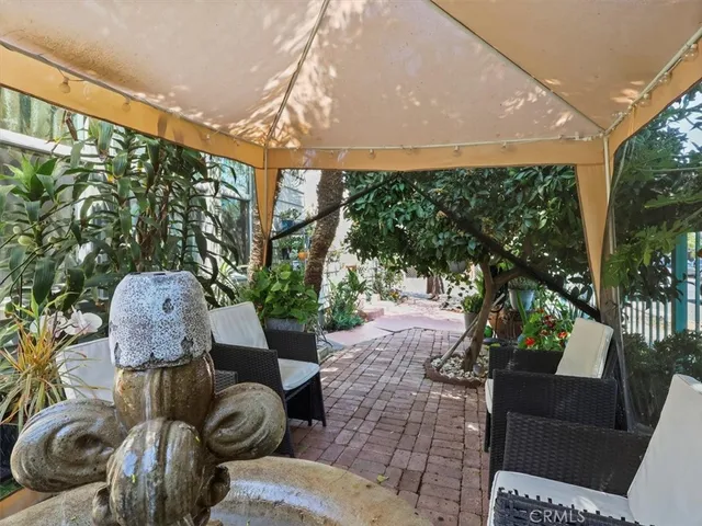 a outdoor living space with furniture and garden view
