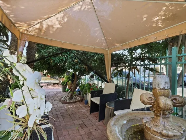 a outdoor living space with furniture and garden view