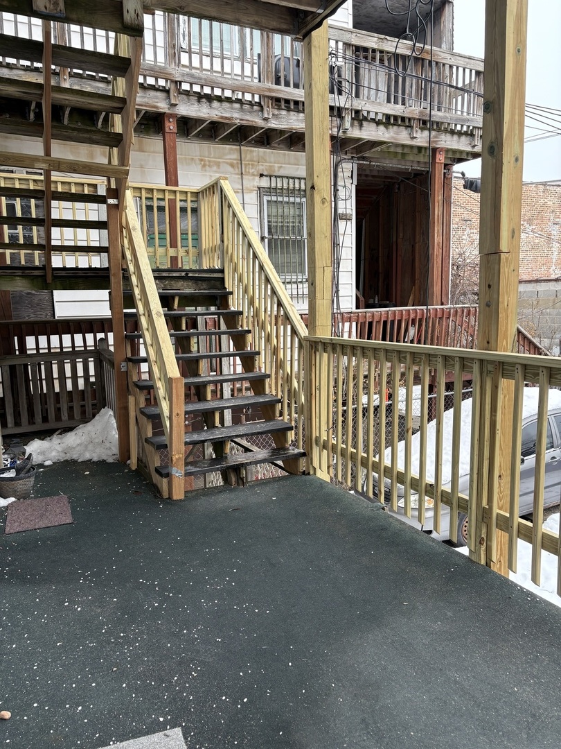 8729 South Commercial Avenue Chicago, IL 60617 - Photo 13 of 17 a view of a balcony with staircase