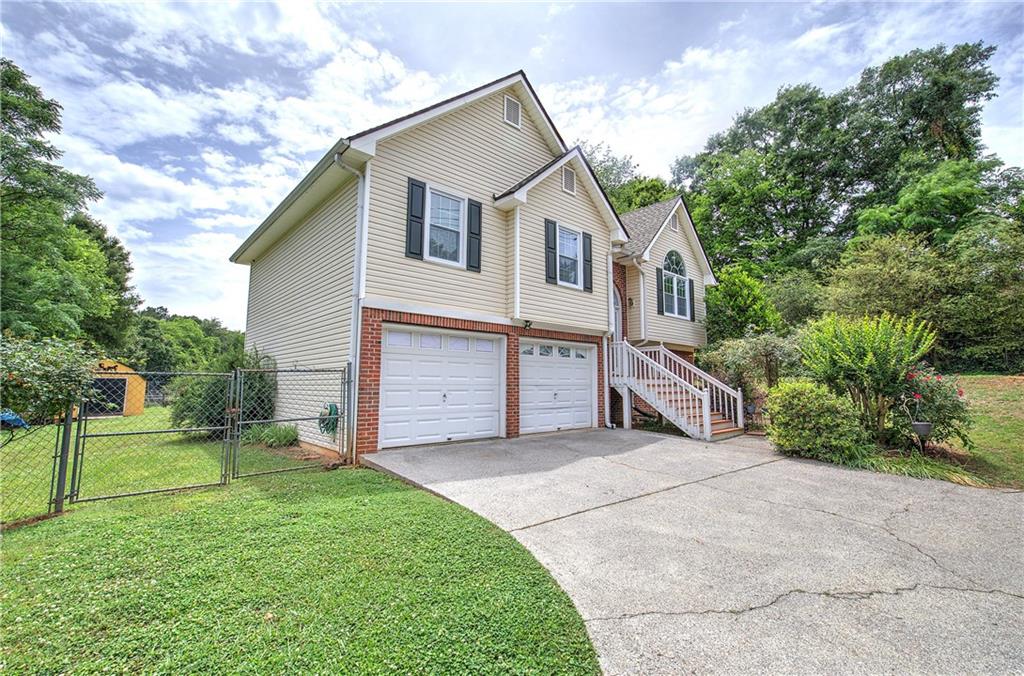 218 Gilreath Road Southeast Cartersville, GA 30121 - Photo 2 of 27 a view of a house with a yard