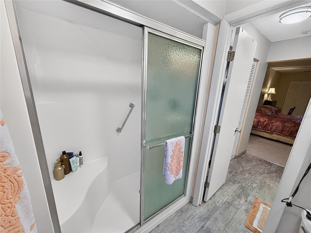 4160 Fruitville Road, Unit 11 Sarasota, FL 34232 - Photo 24 of 63 a bathroom with a tub and shower