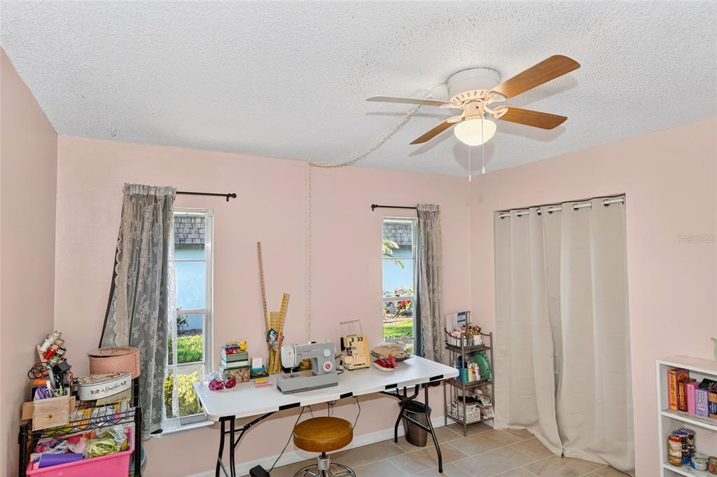 4160 Fruitville Road, Unit 11 Sarasota, FL 34232 - Photo 30 of 63 a living room with furniture and a window