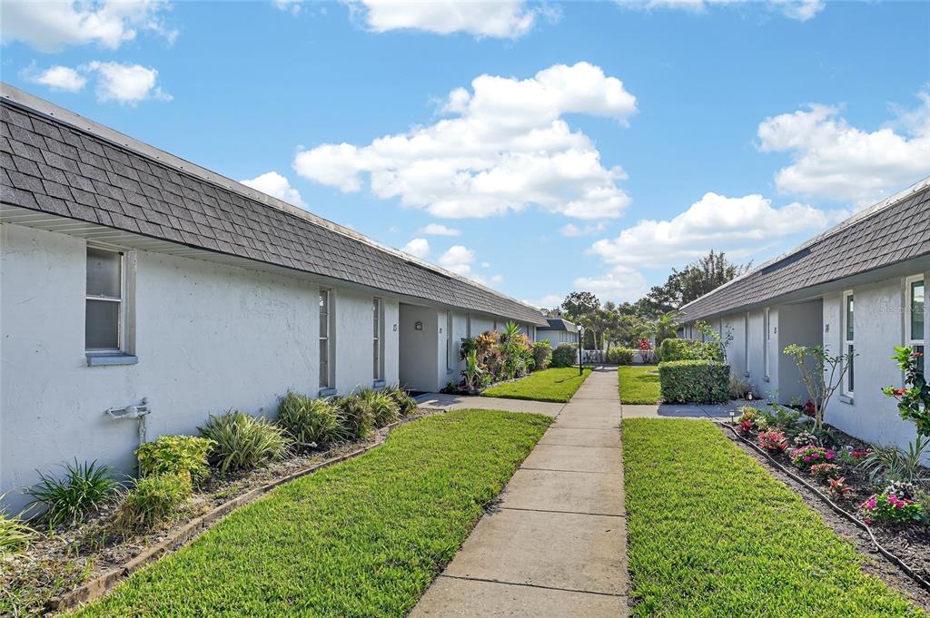 4160 Fruitville Road, Unit 11 Sarasota, FL 34232 - Photo 36 of 63 a front view of house with yard