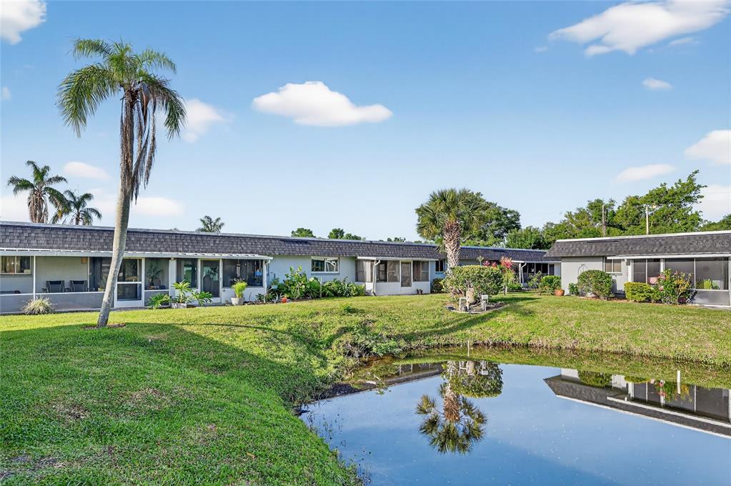 4160 Fruitville Road, Unit 11 Sarasota, FL 34232 - Photo 38 of 63 a front view of a house with garden