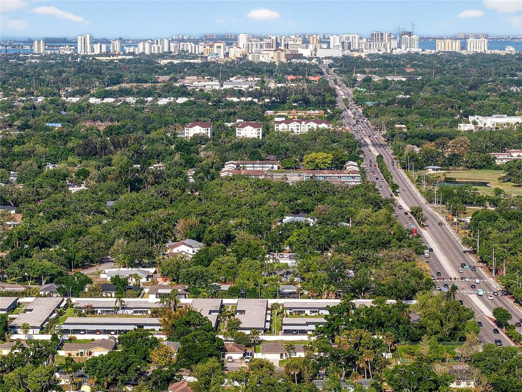 4160 Fruitville Road, Unit 11 Sarasota, FL 34232 - Photo 44 of 63 an aerial view of residential houses with city view