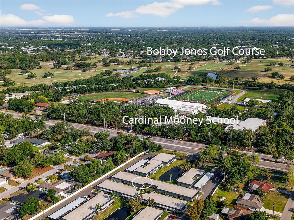4160 Fruitville Road, Unit 11 Sarasota, FL 34232 - Photo 45 of 63 an aerial view of residential houses with outdoor space