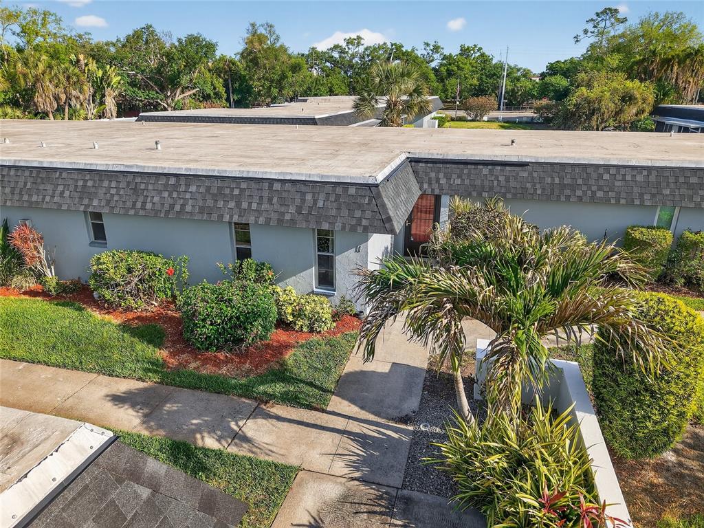 4160 Fruitville Road, Unit 11 Sarasota, FL 34232 - Photo 58 of 63 a view of a swimming pool with a patio