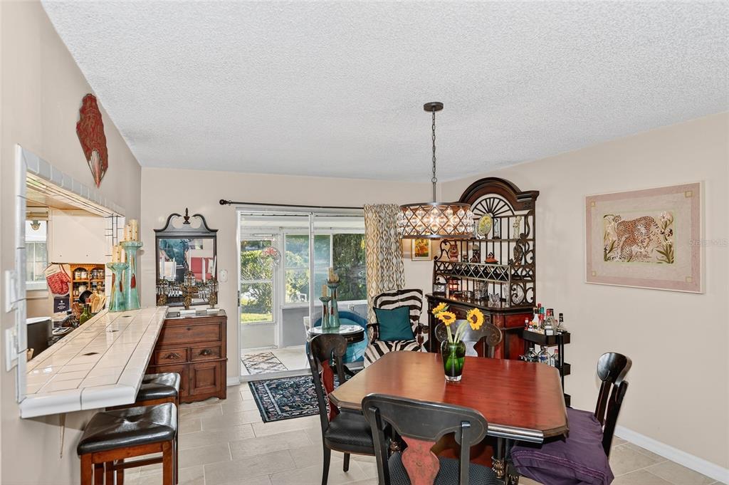 4160 Fruitville Road, Unit 11 Sarasota, FL 34232 - Photo 6 of 63 a view of a workspace with furniture window and wooden floor