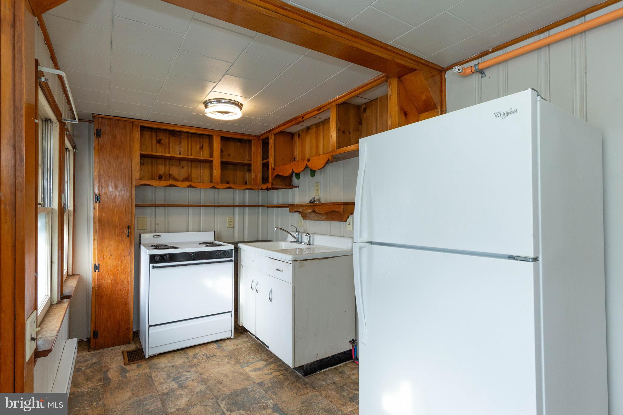 326 East Liberty Street, Unit 6 Charles Town, WV 25414 - Photo 8 of 17 a storage room with washer and dryer