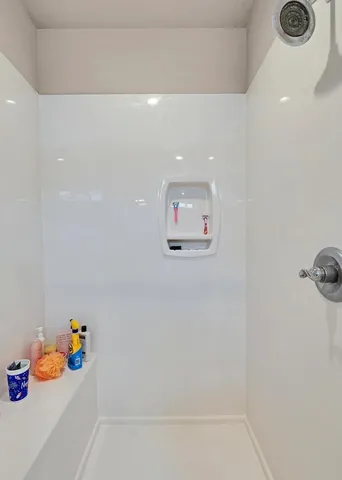 a room with toys and wooden floor