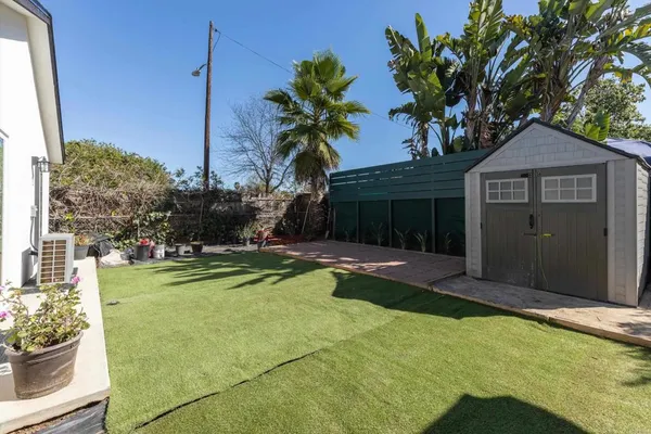a view of a house with swimming pool