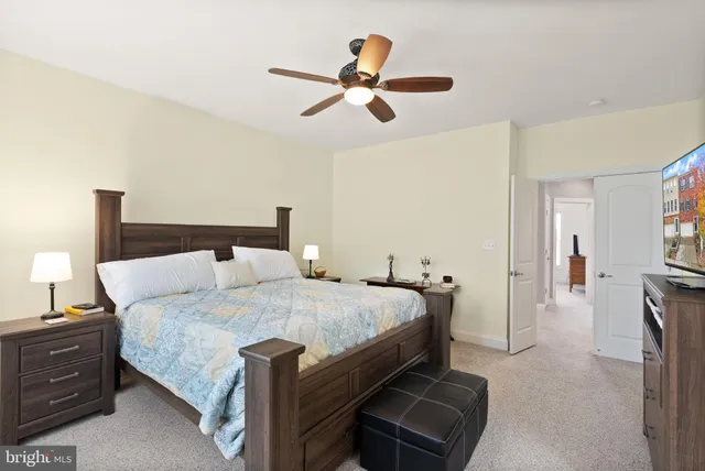 a bedroom with bed and window