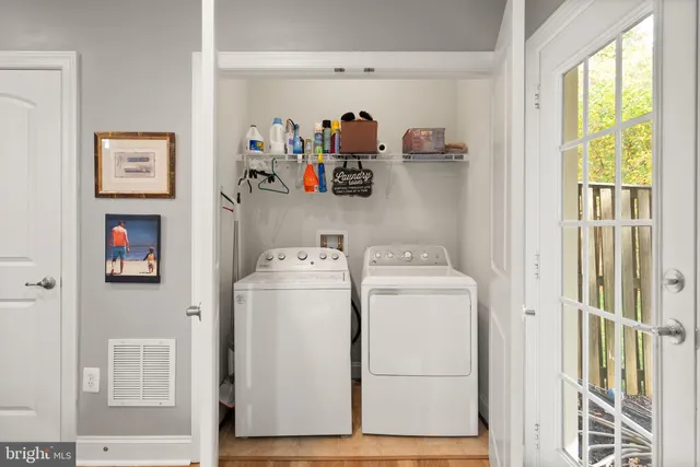 a utility room with dryer and washer