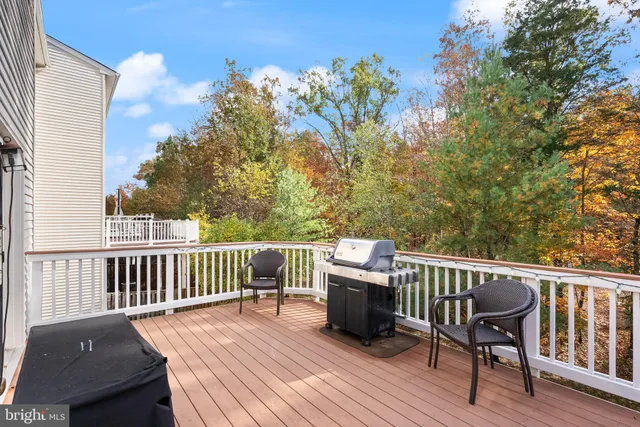 a front view of residential houses with swimming pool and yard