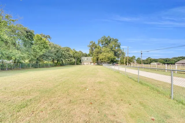 a view of an outdoor space and a yard