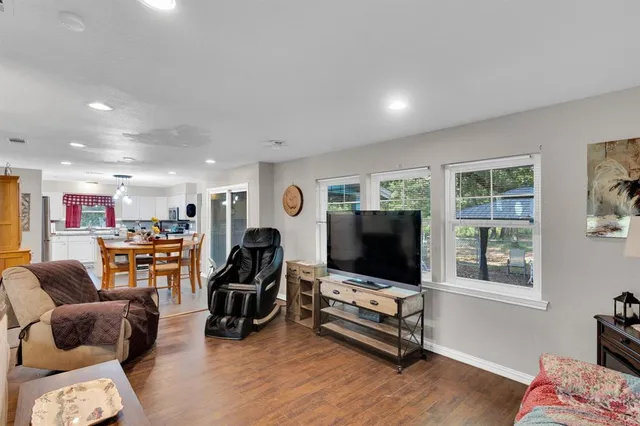 a view of a dining room with furniture window and outside view