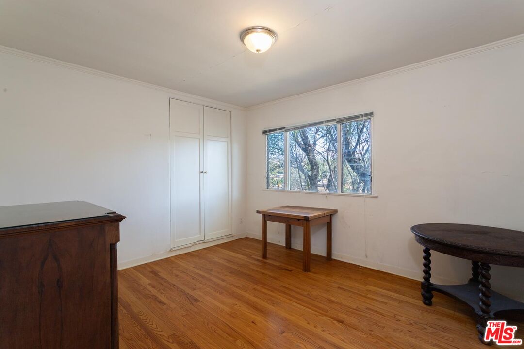 3936 Roderick Road Los Angeles, CA 90065 - Photo 18 of 36 a view of a workspace with furniture and a window
