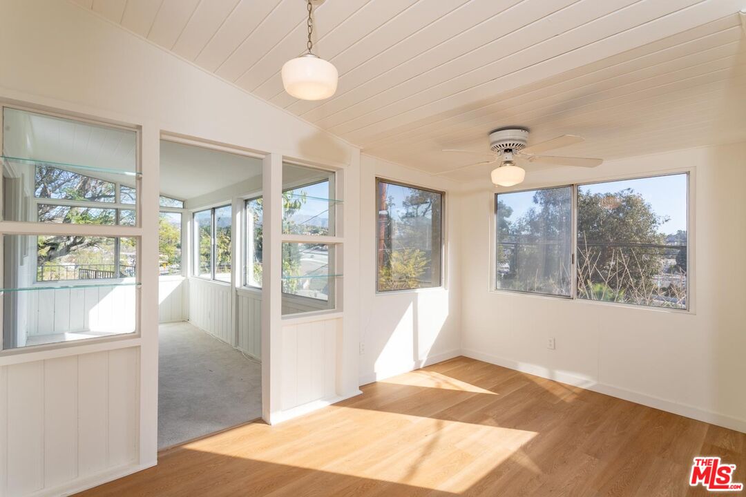 3936 Roderick Road Los Angeles, CA 90065 - Photo 9 of 36 a view of a room with window and wooden floor