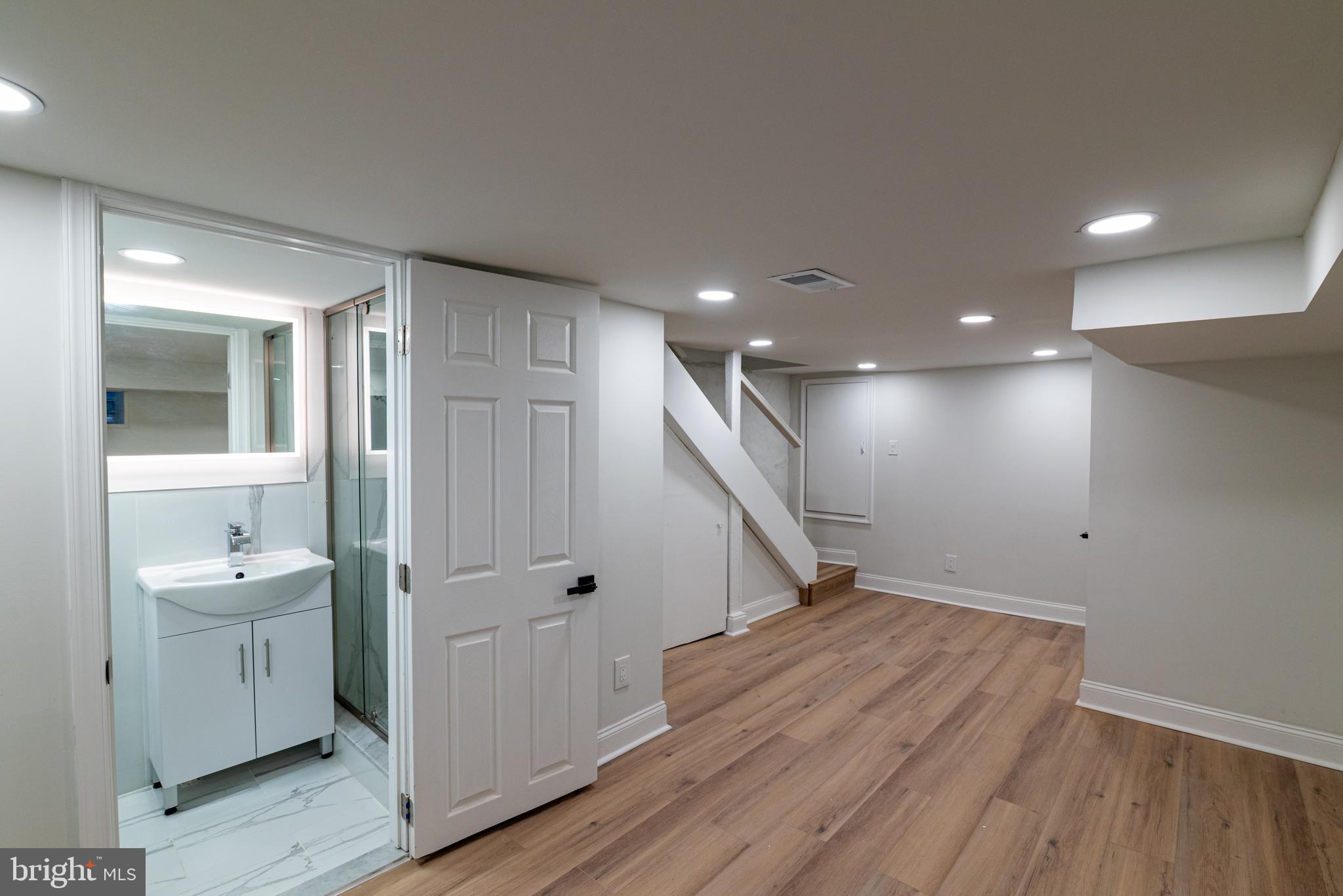 8030 Ferndale Street Philadelphia, PA 19111 - Photo 23 of 36 a view of a hallway with wooden floor
