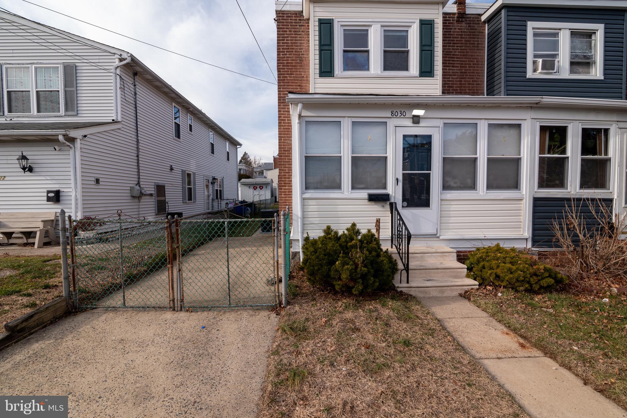 8030 Ferndale Street Philadelphia, PA 19111 - Photo 24 of 36 a front view of a house with a garden