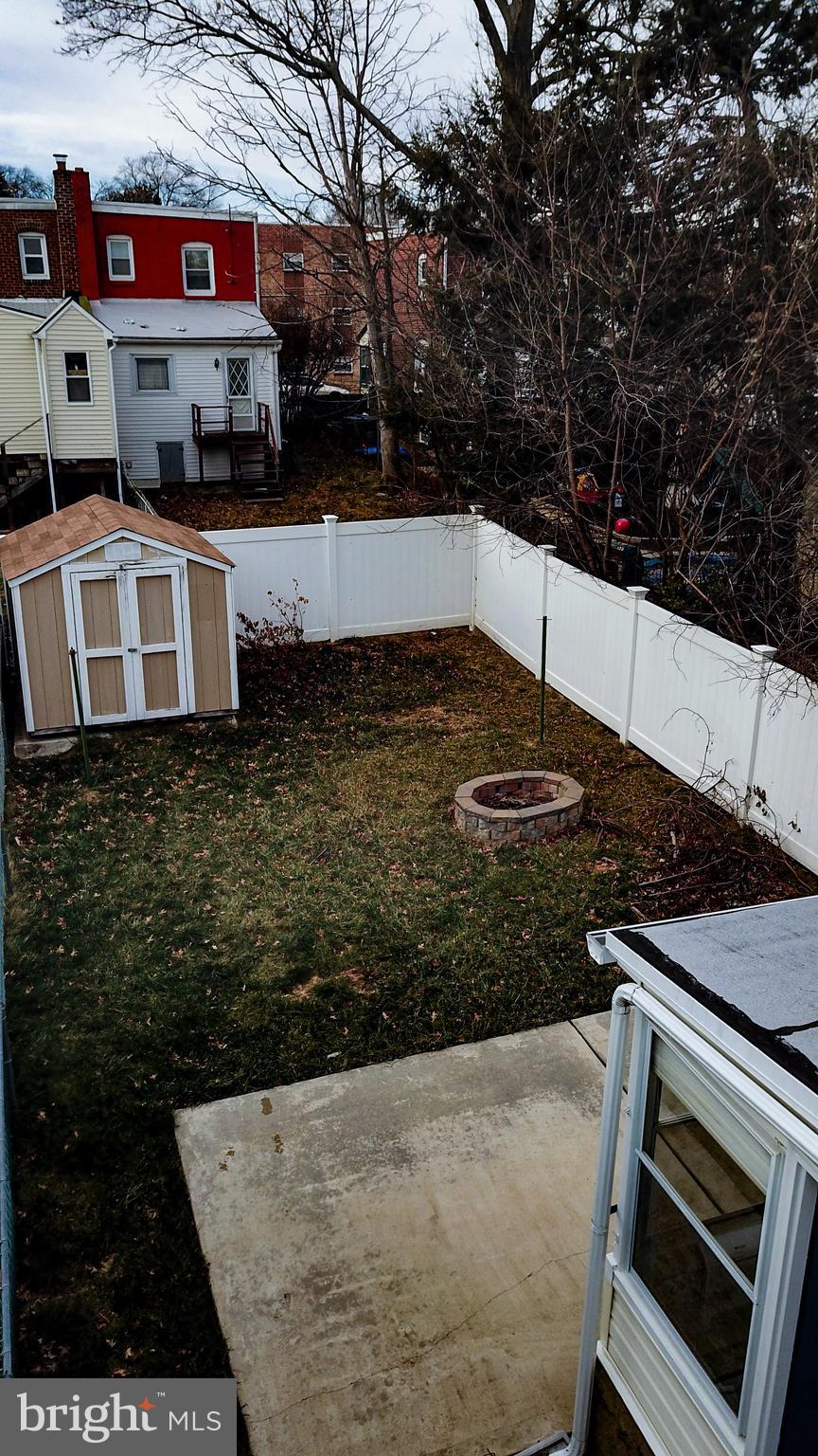 8030 Ferndale Street Philadelphia, PA 19111 - Photo 32 of 36 a view of a kitchen with water heater and a stove