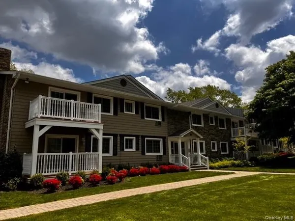 a front view of house with yard