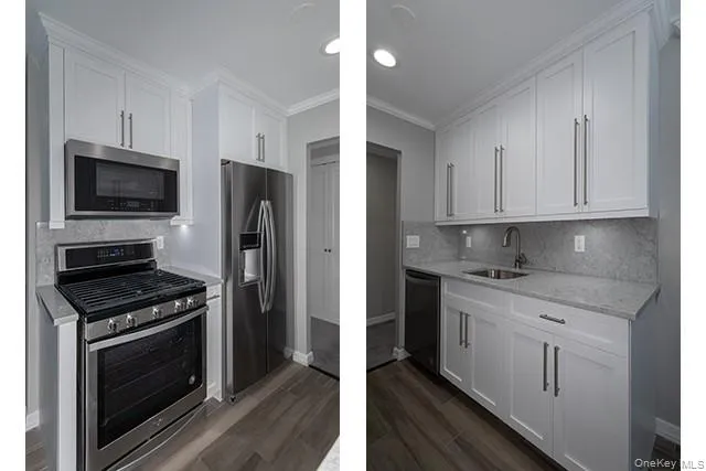 a kitchen with stainless steel appliances a stove microwave and refrigerator