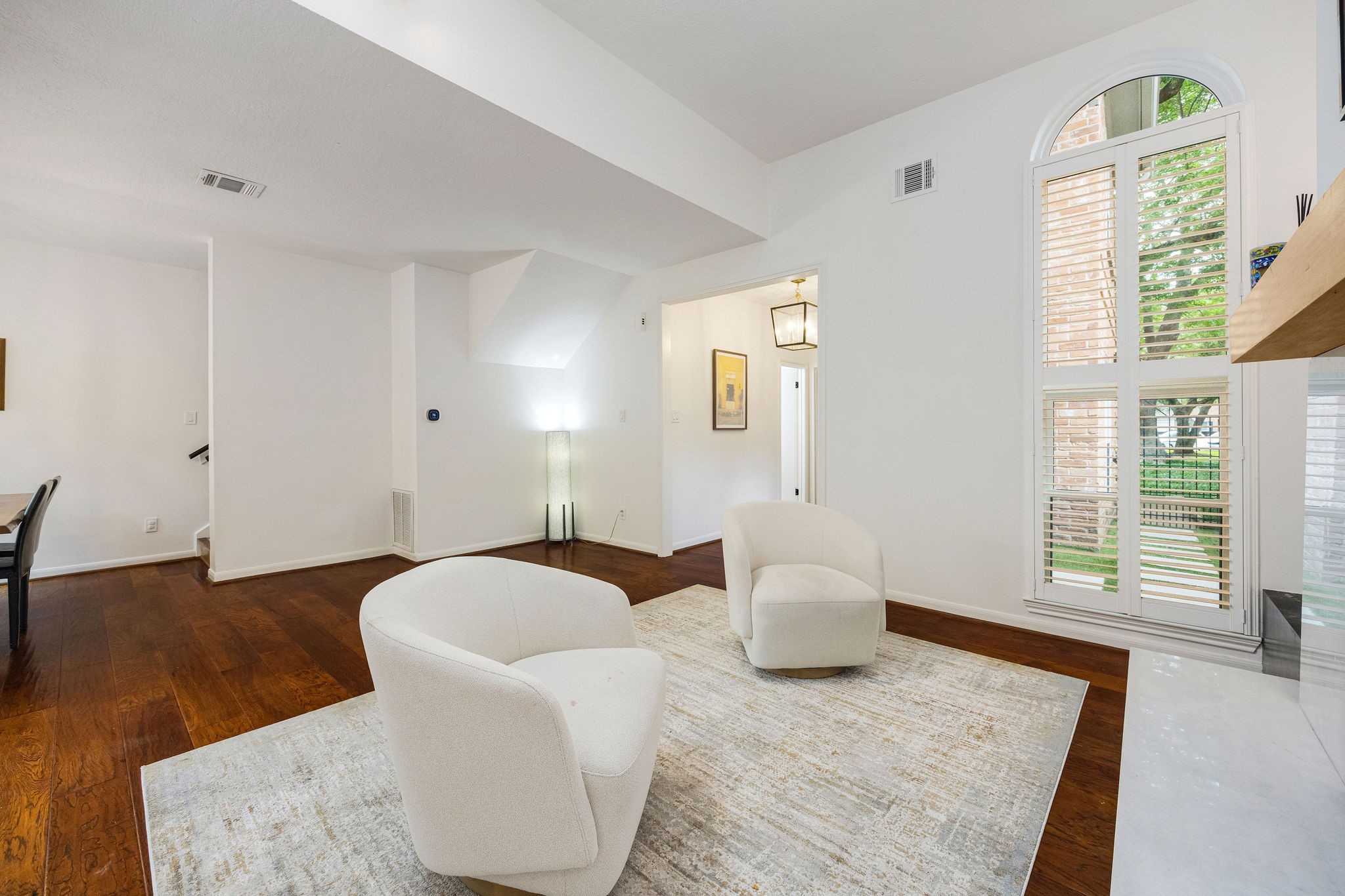 727 Bunker Hill Road, Unit 26 Houston, TX 77024 - Photo 5 of 25 At this angle, you can see that the dining room is to the left. Through the entry at the middle of the photo is access to the half bathroom for guests.