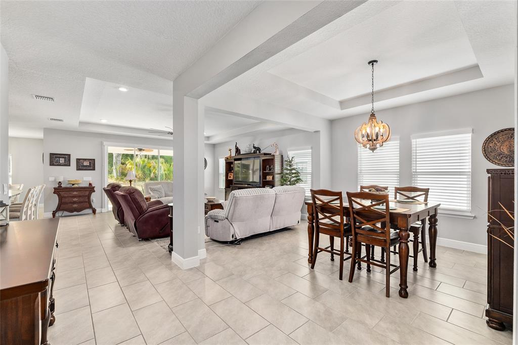 5912 Southwest 46th Drive Gainesville, FL 32608 - Photo 18 of 74 a view of a dining room with furniture