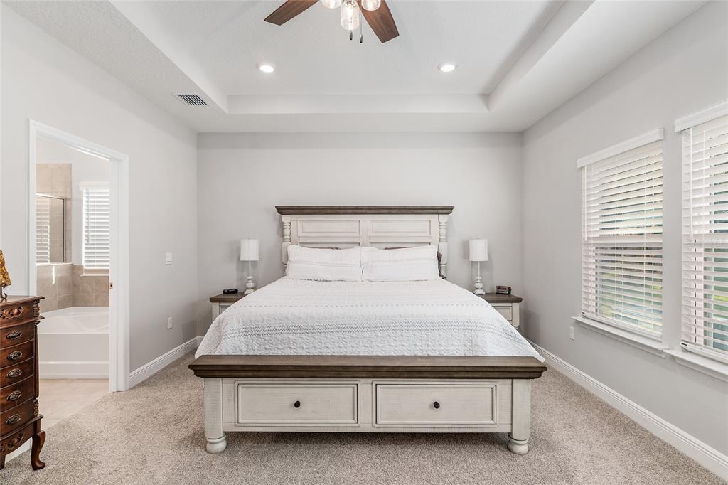 5912 Southwest 46th Drive Gainesville, FL 32608 - Photo 34 of 74 a bedroom with a bed and a window