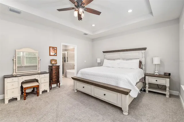 a view of a livingroom with workspace and a window
