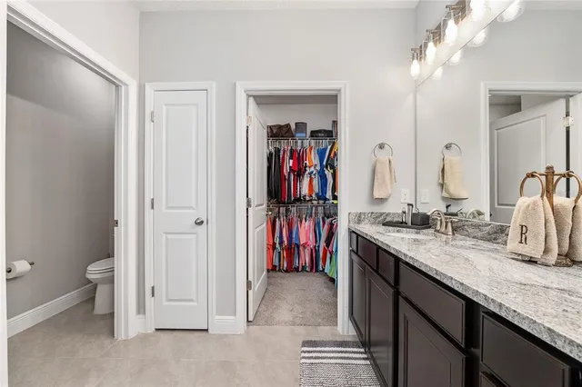 a view of a porch with furniture and a yard