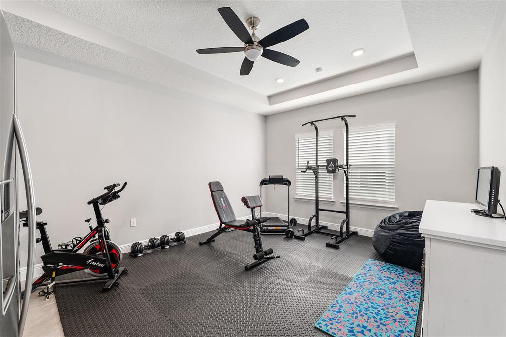 5912 Southwest 46th Drive Gainesville, FL 32608 - Photo 53 of 74 a view of a livingroom with workspace and a window