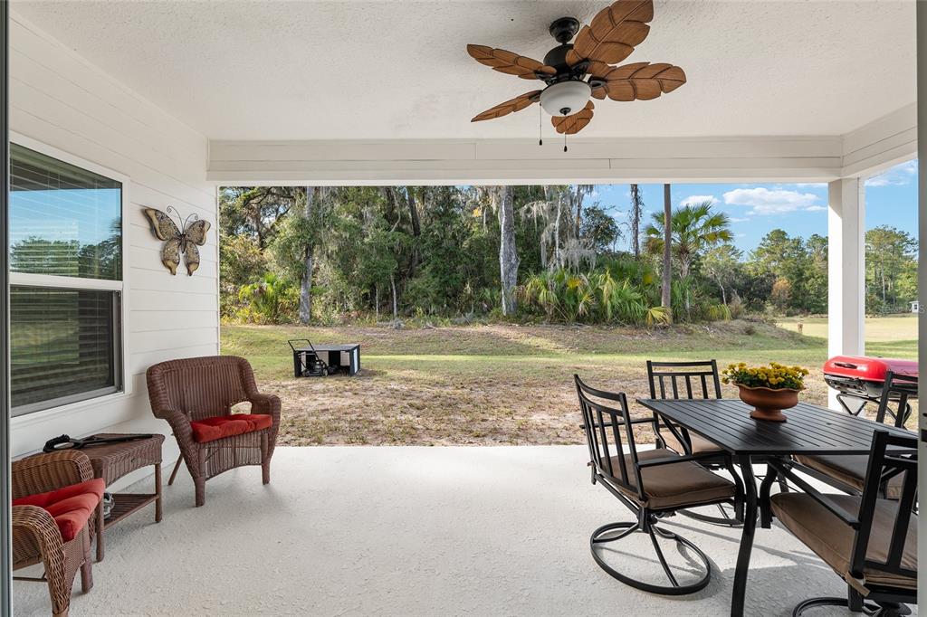 5912 Southwest 46th Drive Gainesville, FL 32608 - Photo 62 of 74 a view of a livingroom with furniture and a table