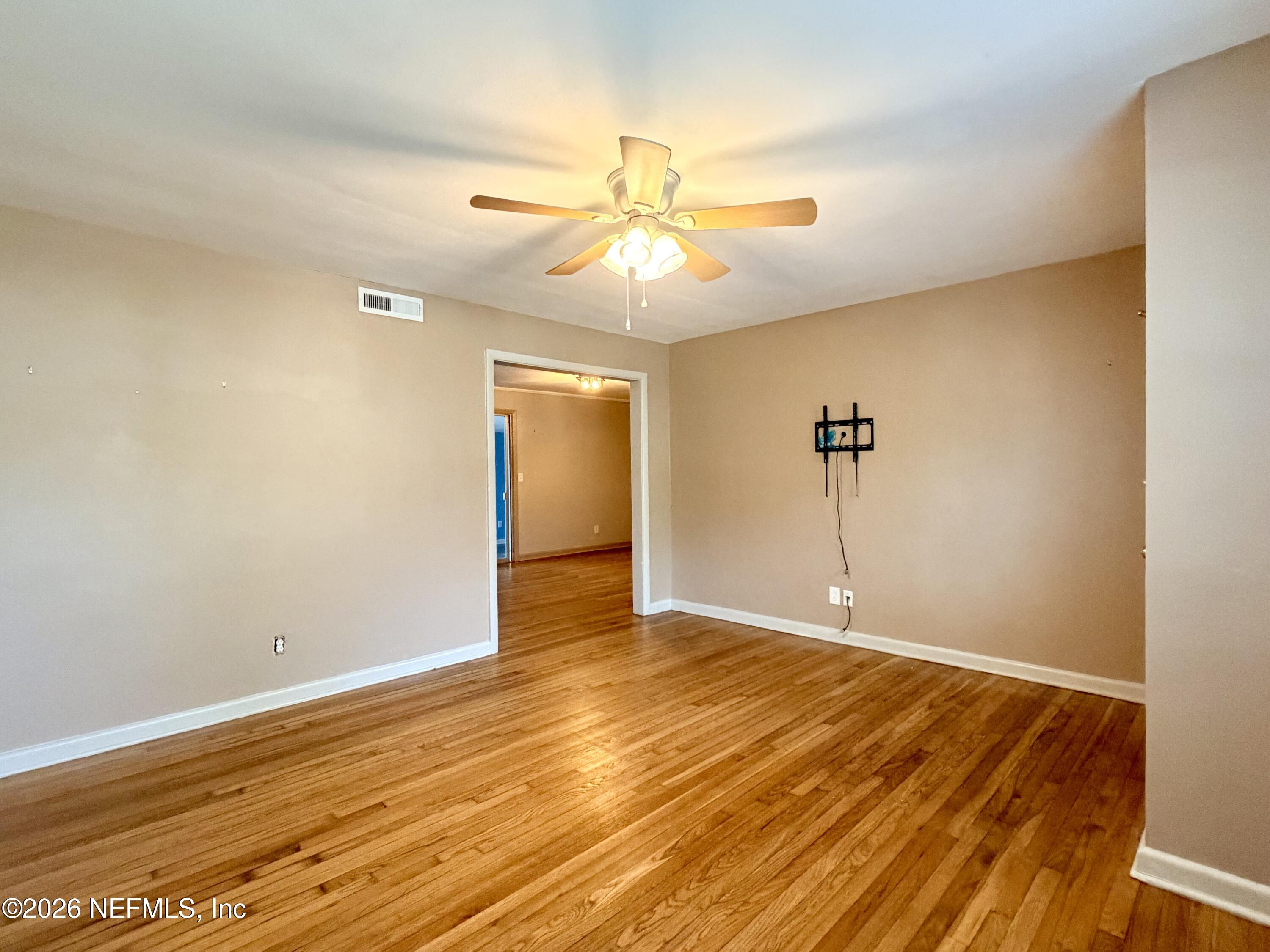 4037 Conga Street Jacksonville, FL 32217 - Photo 6 of 26 wooden floor in an empty room