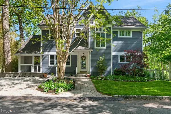 front view of a house with a garden