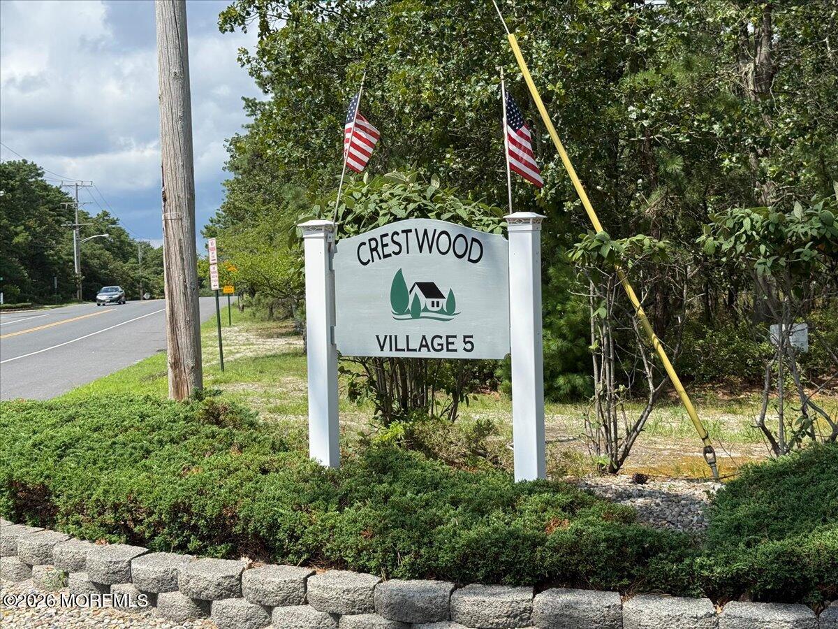 16 D Spring Street, Unit 50 Whiting, NJ 08759 - Photo 26 of 28 a sign on the side of the road