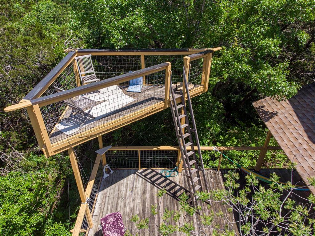 5803 Rittenhouse Shore Drive Austin, TX 78734 - Photo 23 of 35 a view of deck with patio and garden