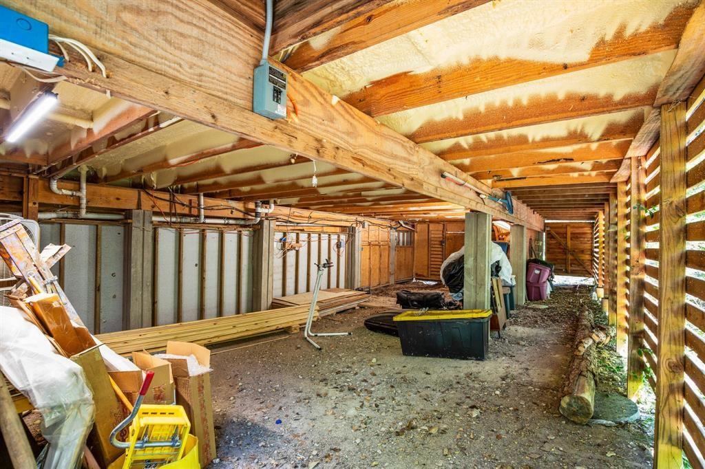 5803 Rittenhouse Shore Drive Austin, TX 78734 - Photo 27 of 35 a view of a patio with table and chairs