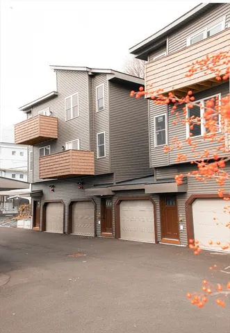 a view of a house with a street
