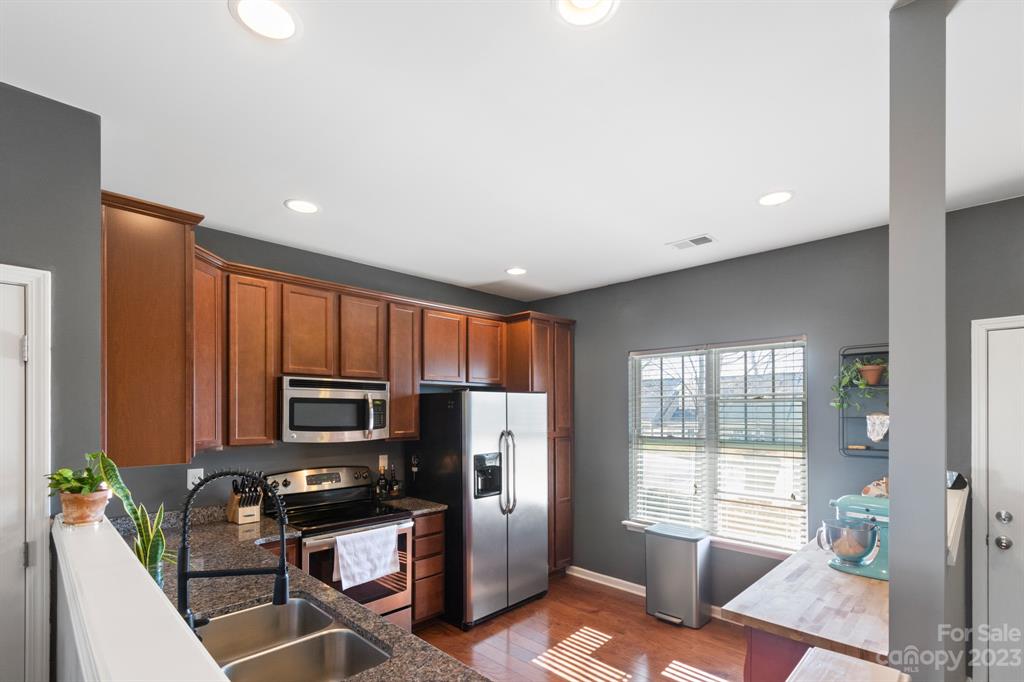 315 Sandy Spring Lane Clover, SC 29710 - Photo 5 of 26 a kitchen with stainless steel appliances a refrigerator sink and microwave