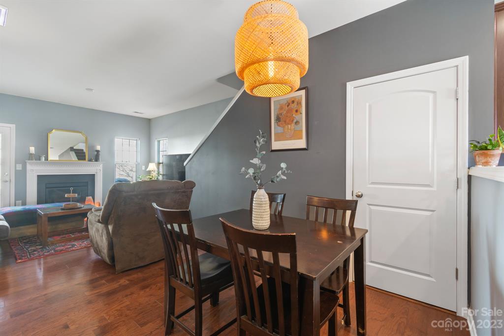 315 Sandy Spring Lane Clover, SC 29710 - Photo 8 of 26 a view of a dining room with furniture and wooden floor