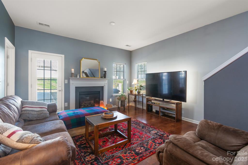 315 Sandy Spring Lane Clover, SC 29710 - Photo 10 of 26 a living room with furniture and a flat screen tv