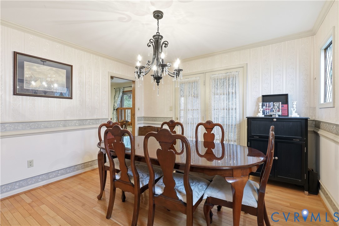 1014 Germar Court Colonial Heights, VA 23834 - Photo 11 of 36 a view of a dining room with furniture and chandelier