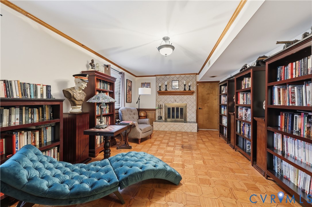 1014 Germar Court Colonial Heights, VA 23834 - Photo 6 of 36 a living room with lots of furniture and a book shelf