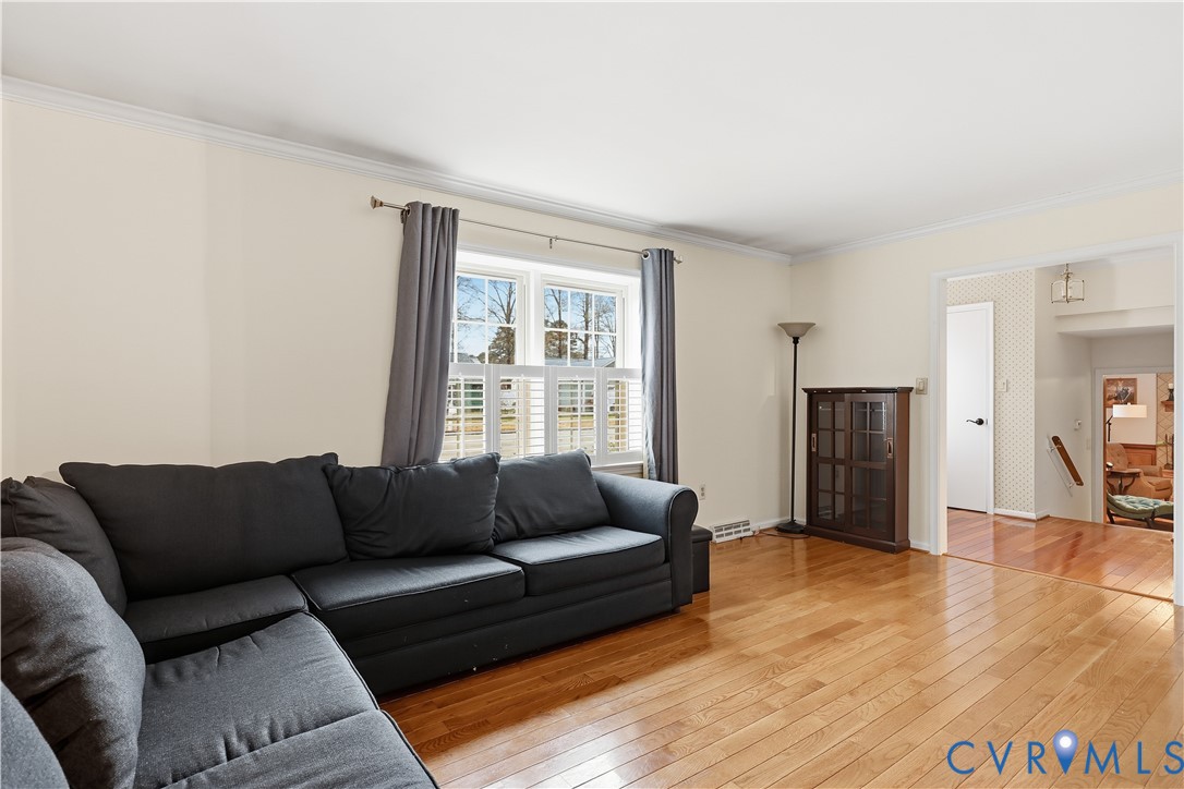1014 Germar Court Colonial Heights, VA 23834 - Photo 8 of 36 a living room with furniture and a hard wood floor
