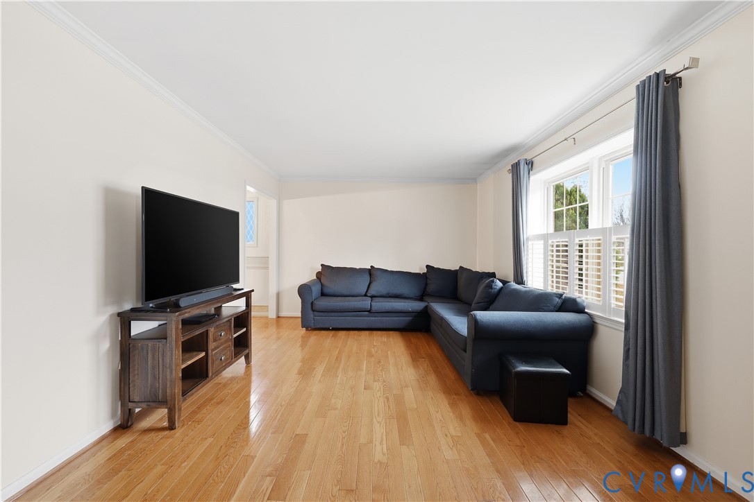 1014 Germar Court Colonial Heights, VA 23834 - Photo 9 of 36 a living room with furniture and a flat screen tv