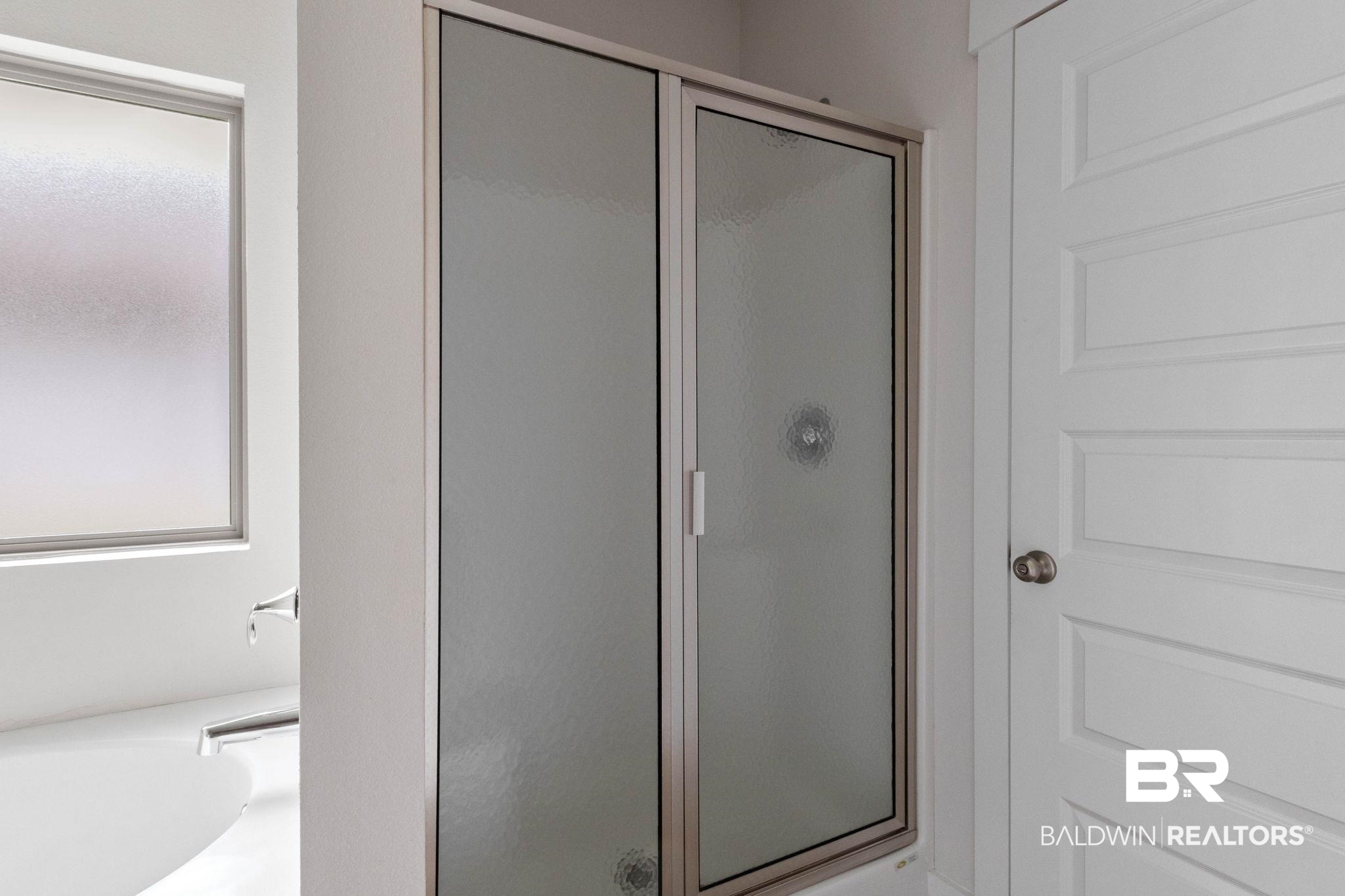 1710 Grouse Street Foley, AL 36535 - Photo 43 of 76 Shower enclosure featuring frosted glass panels and a chrome frame