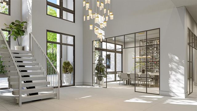 a view of an entryway with chandelier